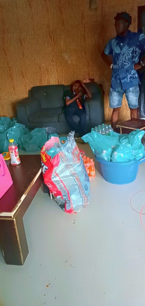 Volunteers preparing bagged provisions and drinks before an outreach