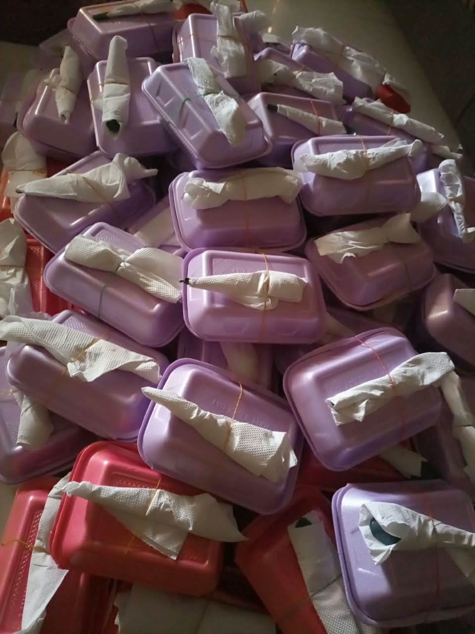 Packed hot meals tied and ready for distribution day
